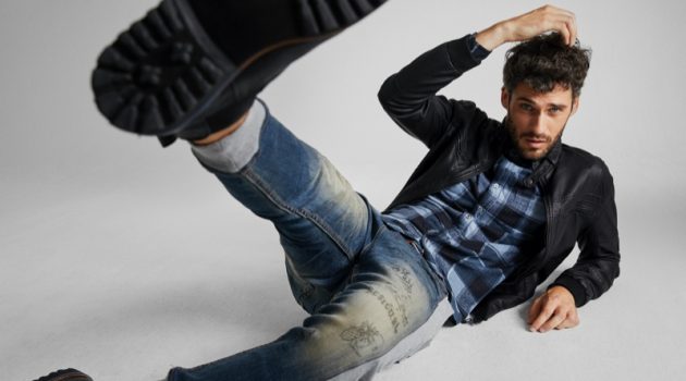 Model Florent Lahmeri sports Desigual's hybrid denim joggers.