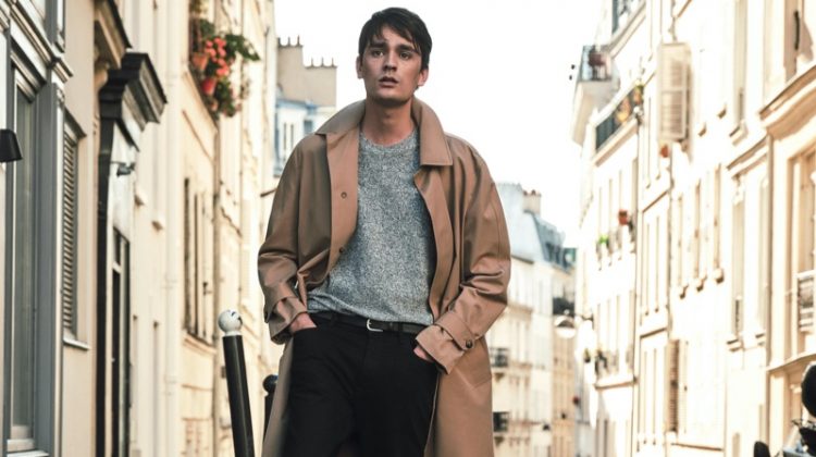 Stepping outside into the Parisian streets, Alain-Fabien Delon sports a trench coat and more essentials from Mango Man.