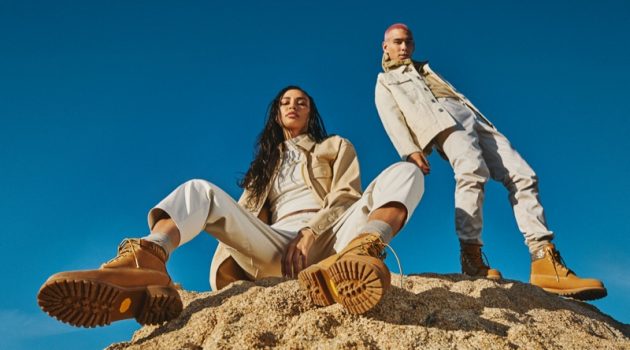 Traveling out to the Californian desert, Evan Mock and Kristen Noel Crawley front the Jimmy Choo x Timberland campaign. The pair dons wheat gold nubuck with glitter spray boots.