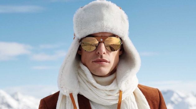 Filip Wolfe styles a sharp Carl Gross look with a trapper hat and cable-knit scarf.