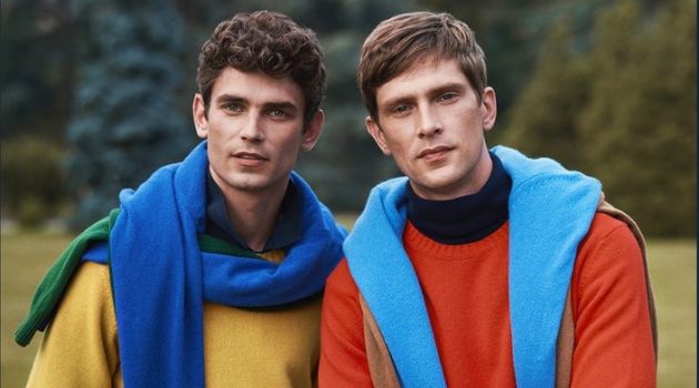 Models Arthur Gosse and Mathias Lauridsen don colorful sweaters for OVS PIOMBO's fall-winter 2020 campaign.