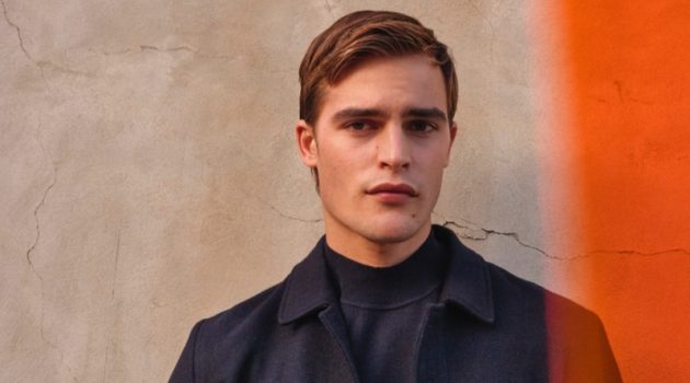 Parker van Noord dons a coat and mock neck sweater from Massimo Dutti.