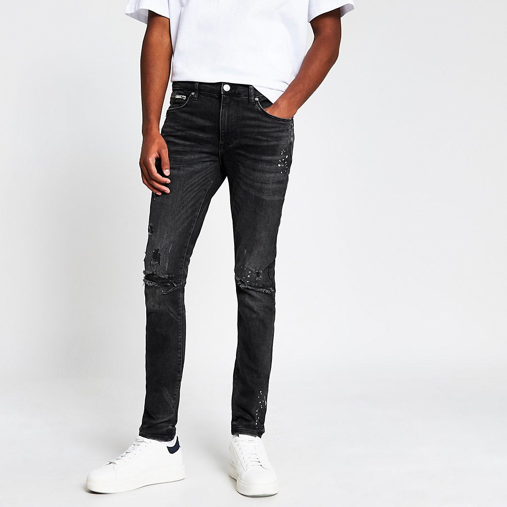 River Island Mens Black ripped skinny fit jeans | The Fashionisto