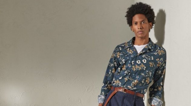 Channeling a resort cool, Rafael Mieses rocks a Todd Snyder Italian floral camp collar long-sleeve shirt in navy with Japanese denim pleated pants in indigo.