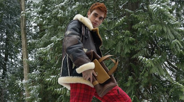 KJ Apa sports a look from Coach's fall-winter 2021 men's collection.