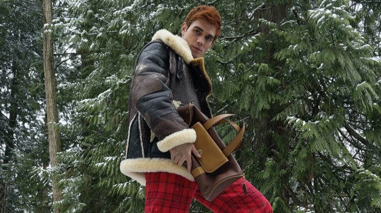 KJ Apa sports a look from Coach's fall-winter 2021 men's collection.