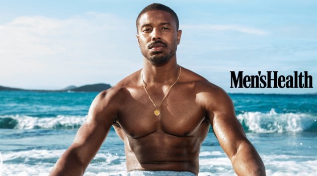 Taking to St. Barts with Men's Health, Michael B. Jordan sports Coach swim shorts with a Movado bracelet.