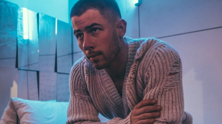 Nick Jonas dons the Speedmaster Moonwatch Master Chronometer Canopus Gold watch for his "Spaceman" music video.