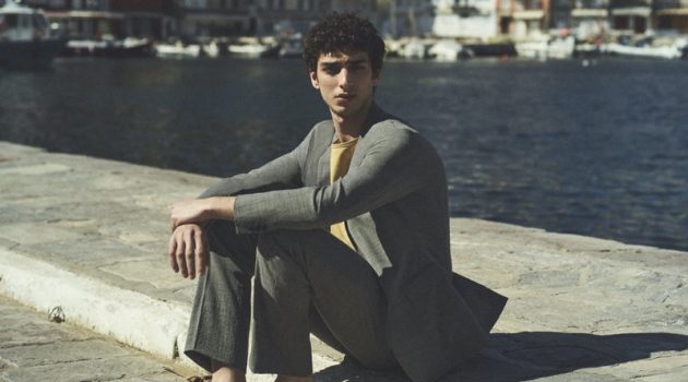 Donning a trim suit, Qaher Harhash stars in Theory's spring-summer 2021 campaign.