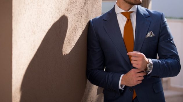 Cropped Man Blue Suit Orange Tie Pocket Square