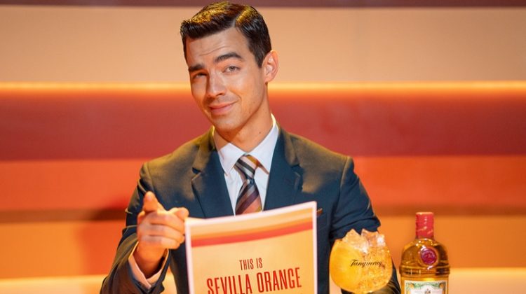 Joe Jonas plays a news anchor for the new Tanqueray Sevilla Orange campaign.