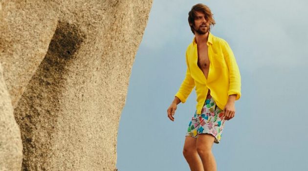 James Crabtree models a yellow shirt with Vilebrequin's 1986 Memphis swim trunks.