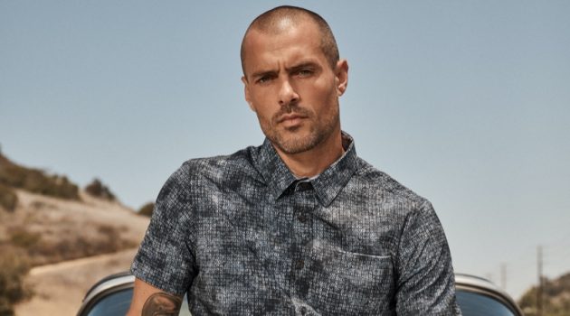 Sporting a printed short-sleeve shirt, Zac Taylor fronts 7Diamonds' summer 2021 campaign.