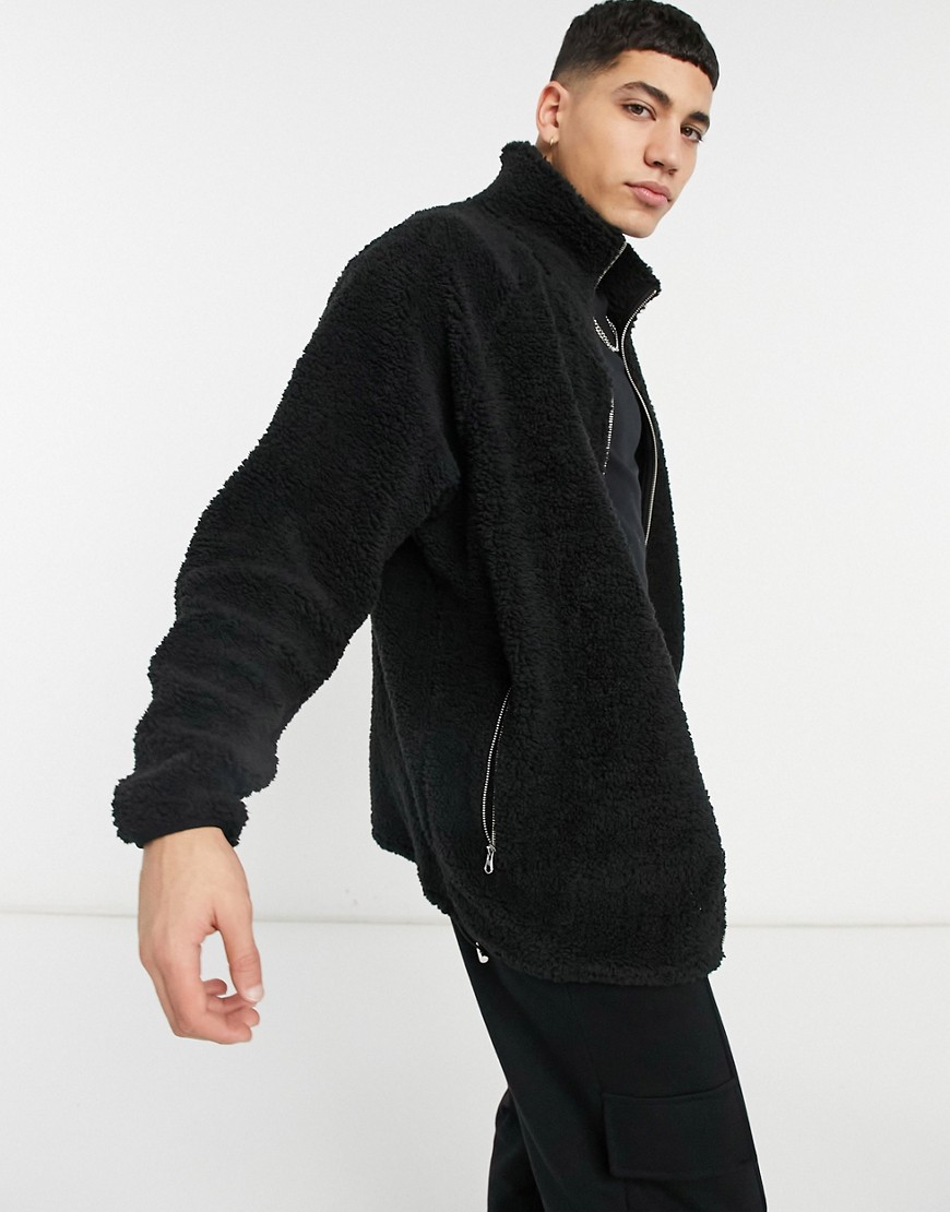 ASOS DESIGN oversized teddy track top with deep funnel in black | The ...