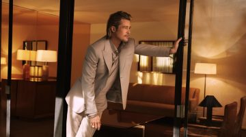 Brad Pitt dons a dusty pink sustainable virgin wool tuxedo with a silk evening shirt for Brioni's fall-winter 2021 campaign.