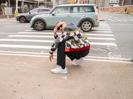 DJ Snake poses for a photo in his new PUMA Mirage Sport sneakers.