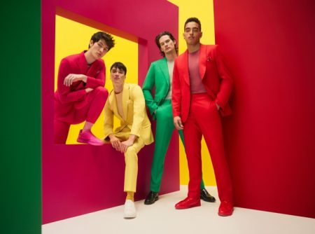 Models Brandon Soon Shiong, Stephen Allen, Joey Kirchner, and Justin Lyons don colorful suiting numbers from Indochino's spring-summer 2022 collection.