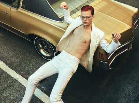 Going shirtless for Fashion magazine, Jake Wesley Rogers wears an Alexander McQueen suit with Saint Laurent shoes and Gentle Monster glasses. Photo Credit: Greg Swales