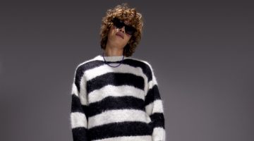 Making a statement in black and white, Arthur Kelso sports MOTHER's striped The Jumper sweater with The Neat jeans.