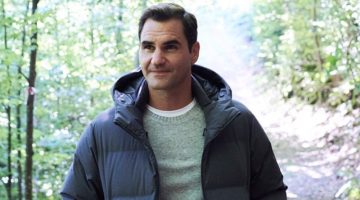 Roger Federer wears a UNIQLO seamless down 3D cut parka in navy.