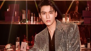 Gong Jun is a glam holiday vision in a silver dinner jacket for a new Charlotte Tilbury campaign.