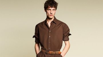 Valentin Caron makes a case for monochrome style in a brown shirt with pleated trousers for Tod's pre-spring 2023 campaign.