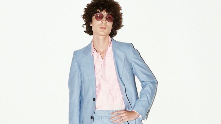 Paul-Emile Paillier wears a light blue denim suit from the Viktor & Rolf Mister Mister spring-summer 2023 collection.