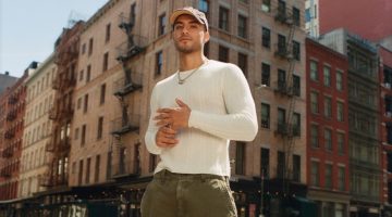 Cy Sandoval models a ribbed sweater with cargo pants from Abercrombie & Fitch's Vintage Reissue collection.