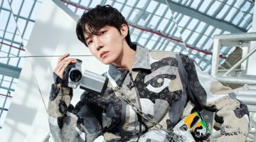 J-Hope sports a monogram print outfit for Louis Vuitton's fall-winter 2023 campaign.