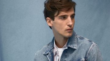 Model Anatol Modzelewski takes the spotlight in a jean jacket paired with a striped shirt from Pepe Jeans.