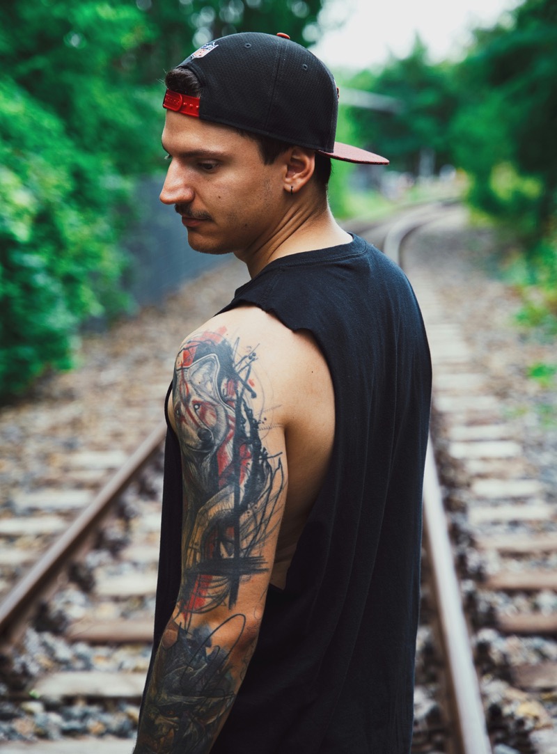 Channel the essence of wild animals with dynamic animal sleeve tattoos. 