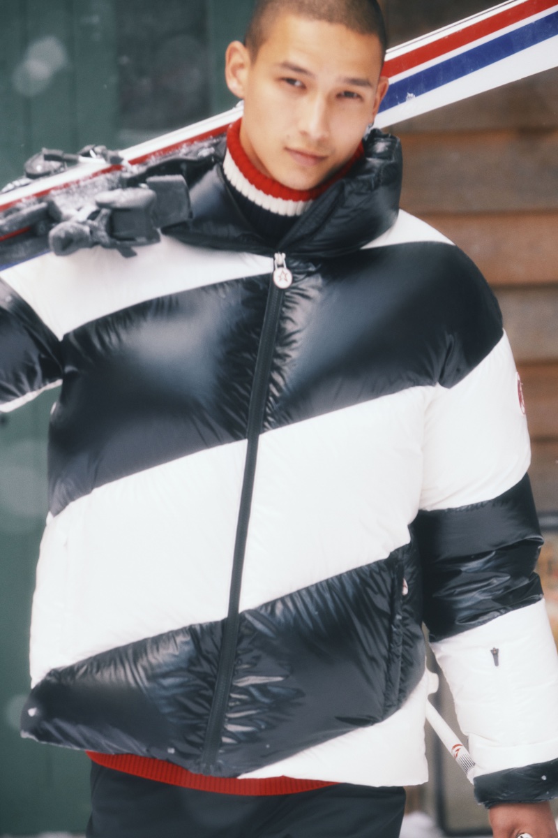 Tommy Vanden Meerssche, ready for the slopes, exudes effortless cool in a black and white Perfect Moment puffer jacket.