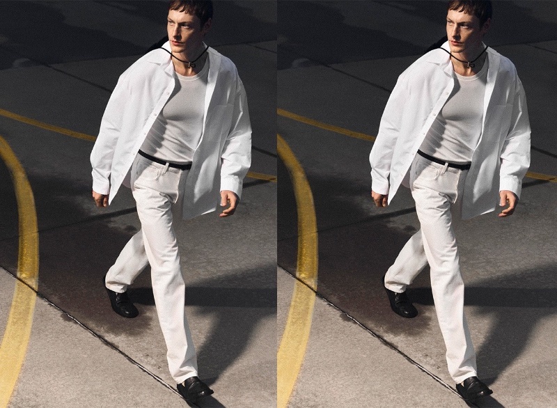 On the move, Roberto Sipos dons a JACQUEMUS shirt, Jil Sander long-sleeve t-shirt, The Row jeans, and an Ann Demeulemeester belt.