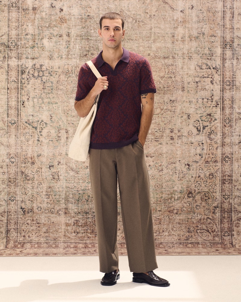 Relaxed proportions shine with Abercrombie & Fitch's baggy trousers paired with a jacquard pattern Johnny collar sweater polo. 