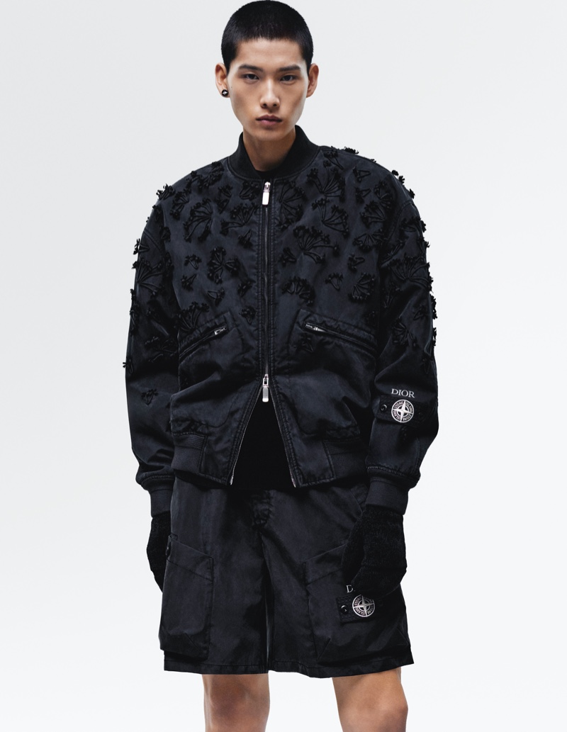 Dugyeong Kim wears an all-black look from the Dior and Stone Island collection. 
