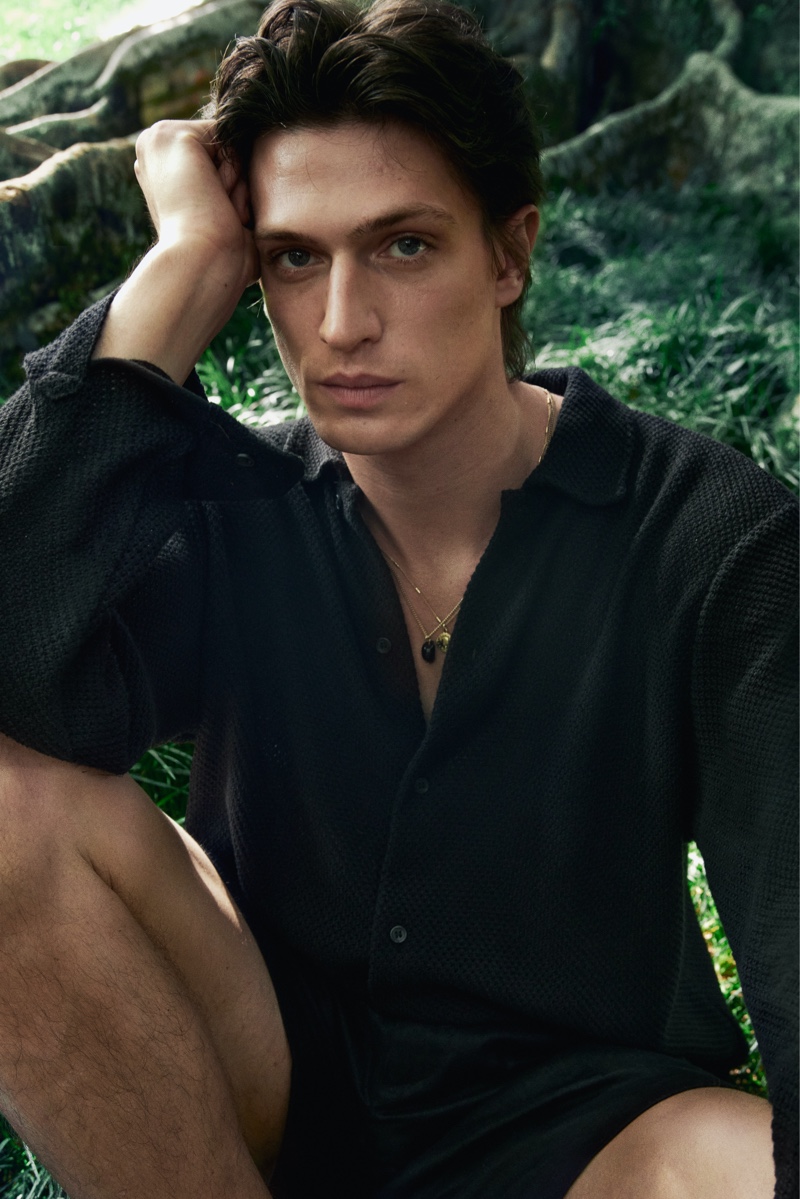 Edoardo Sebastianelli sports an all-black outfit for H&M's summer 2024 campaign.
