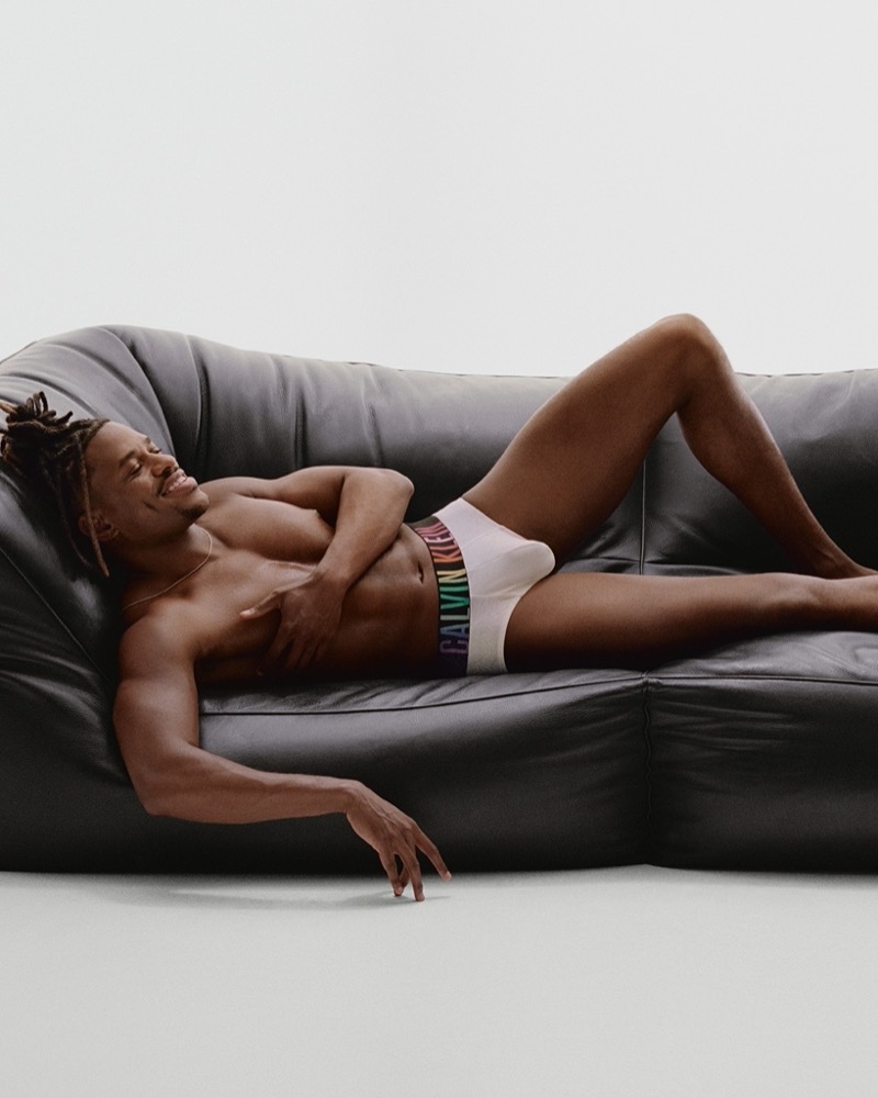 Reclining, Jeremy Pope wears the Intense Power Pride sports brief for Calvin Klein's 2024 Pride campaign.