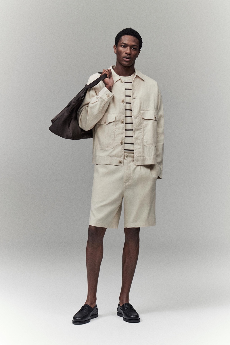 Hamid Onifade hits the studio in a linen overshirt and shorts with dress shoes.