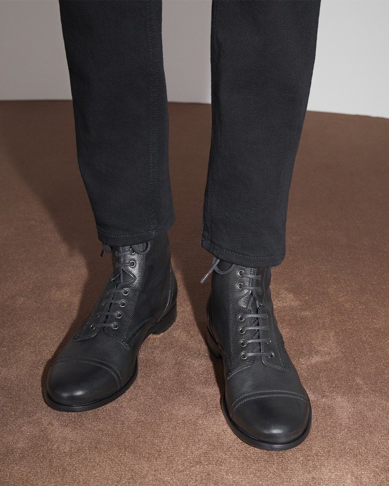 Black leather boots from the Bally Travel Collection by Adrien Brody are perfect for a stylish day or evening out. 