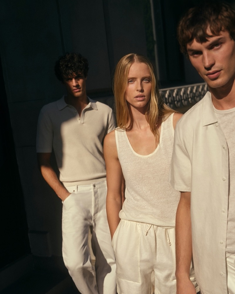 Models Francesco Ruggiero, Abby Champion, and Kit Butler bring a monochromatic allure to Calvin Klein, exuding effortless elegance in minimalist white ensembles. 