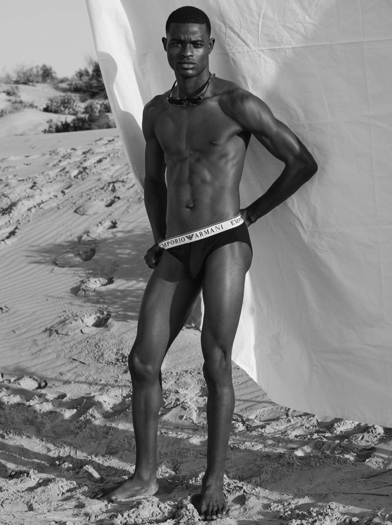 Kelvin Adewole stars in Emporio Armani's spring-summer 2024 underwear campaign, sporting black briefs. 