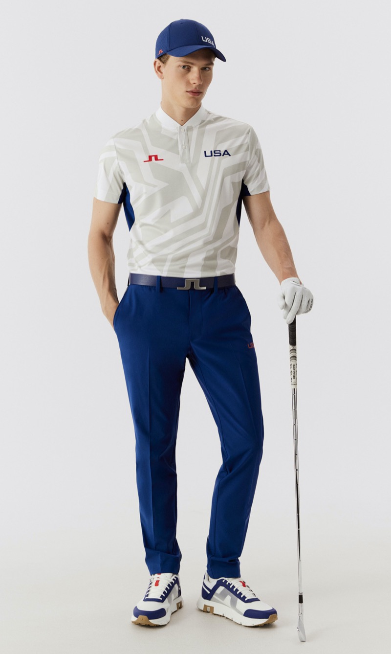 A modern twist on classic colors, the U.S. Olympic golf team sports a white and blue patterned polo with sleek blue trousers from J.Lindeberg.