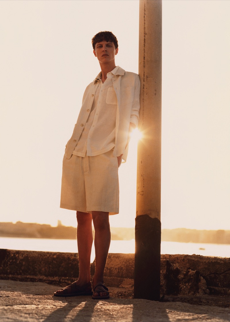 Captured against a setting sun, Tim Schuhmacher embraces a relaxed vibe in Mango's linen ensemble for summer 2024.