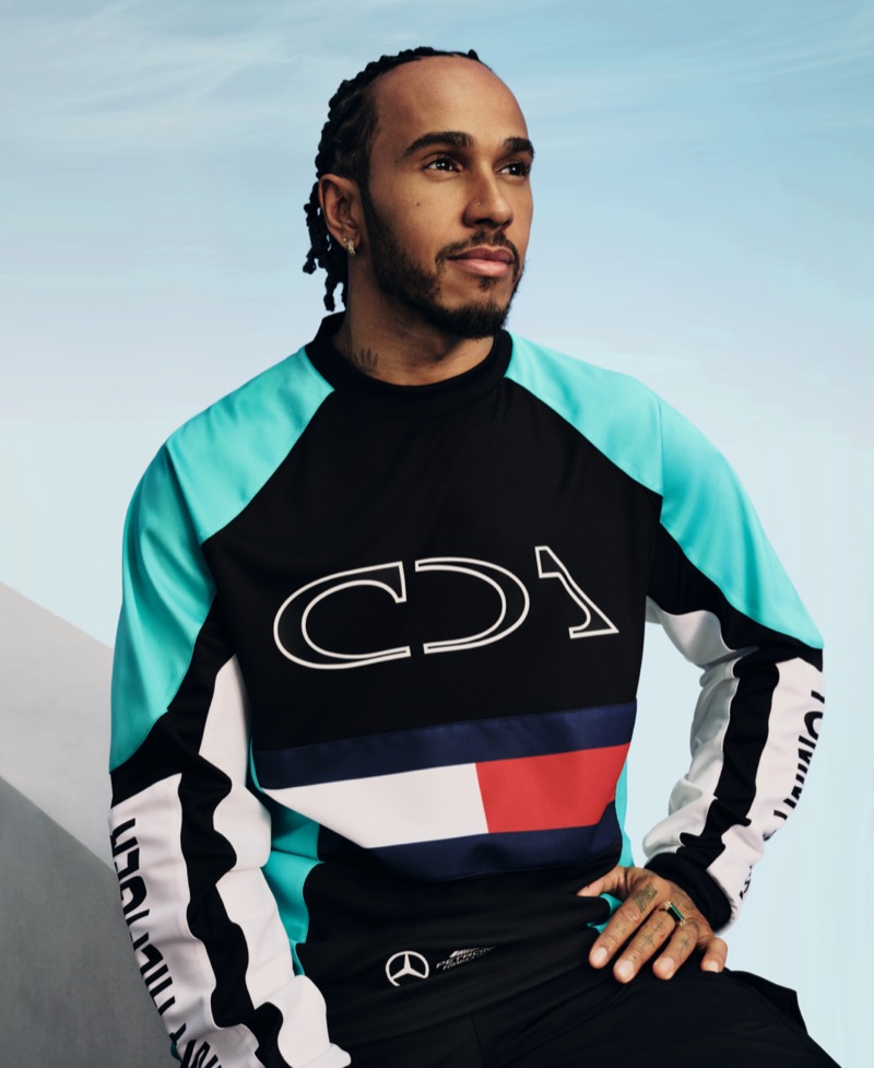 Lewis Hamilton shines solo, wearing a standout piece from the Tommy Hilfiger x Mercedes AMG Petronas F1 x Clarence Ruth collection.