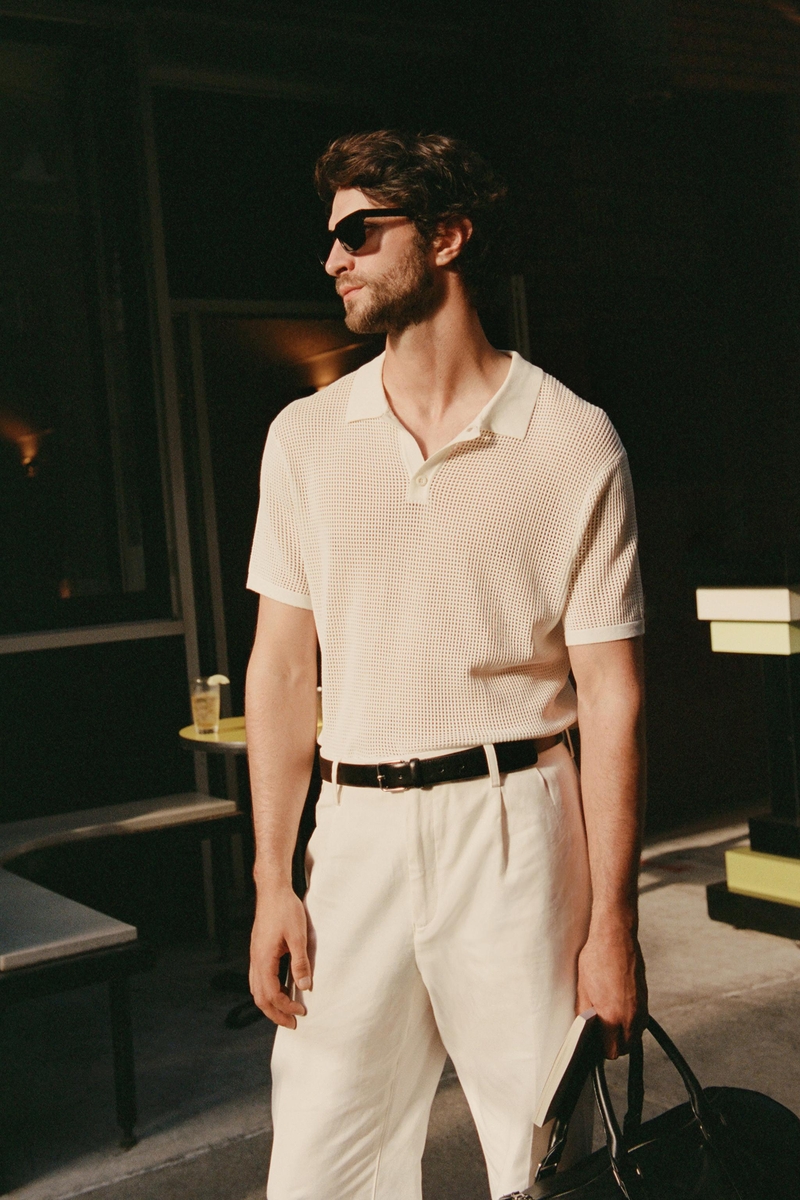 Zara's summer 2024 collection gets a modern twist with Matthew Bell in a mesh polo and crisp white linen pants. 