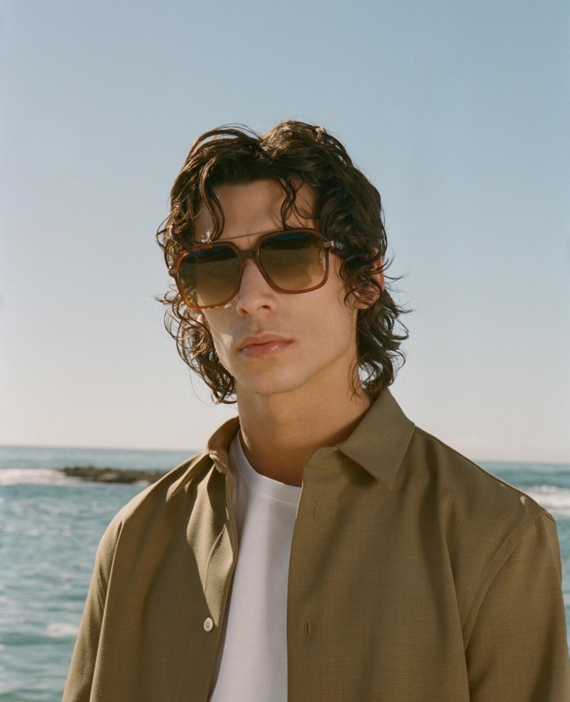 Donovan Wildfong captures effortless cool in Barton Perreira’s D.Ellis sunglasses with their oversized square frames.