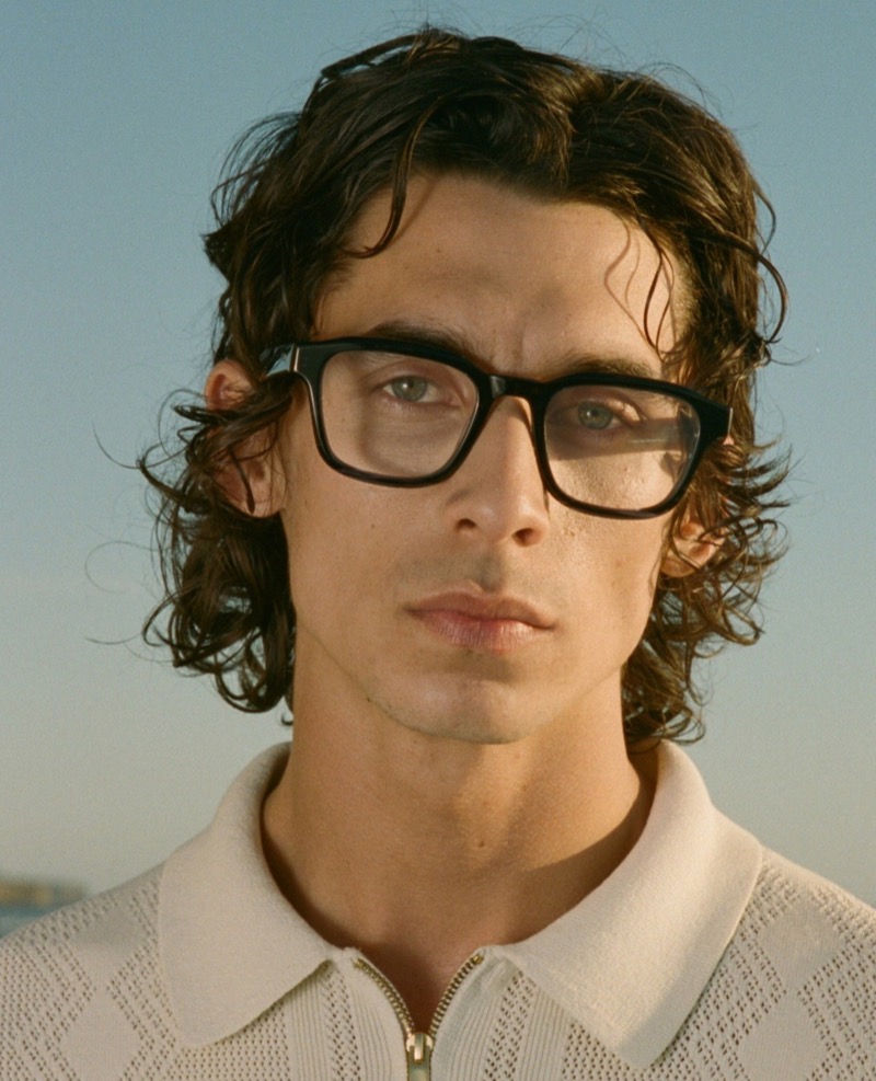 Donovan Wildfong exudes intellectual charm in Barton Perreira’s Winton eyeglasses, characterized by their vintage-inspired square frame.