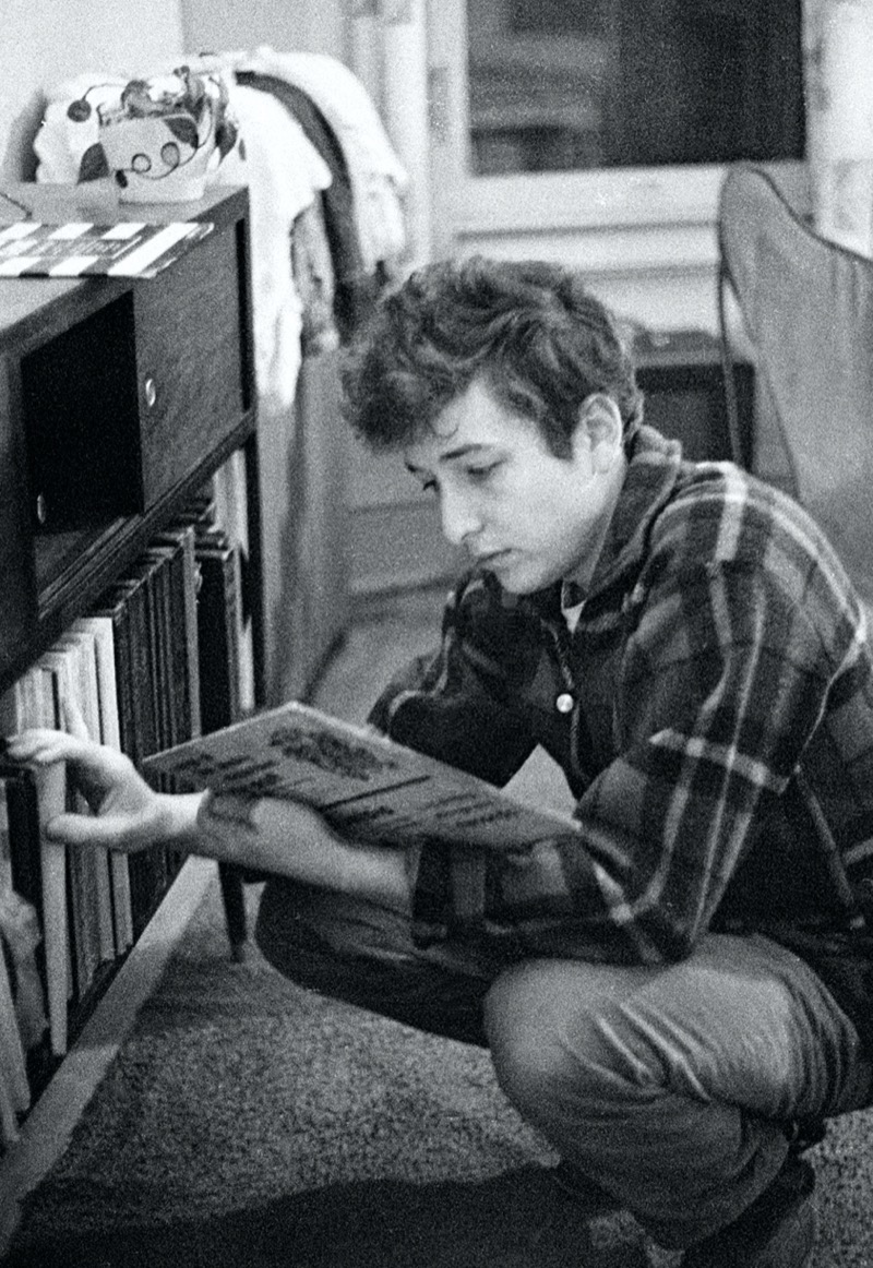 Pictured in 1962, Bob Dylan wears flannel with jeans.