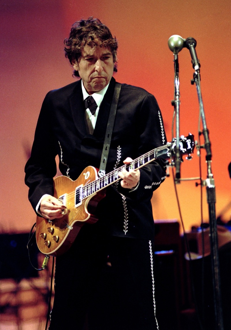 Bob Dylan wears a Western-style suit to perform at a 1997 concert in Italy.