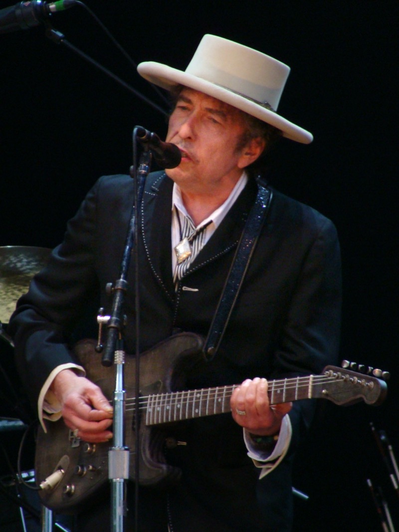 Bob Dylan wears a gambler hat and bolo tie as he performs at the Azkena Rock Festival in 2010.